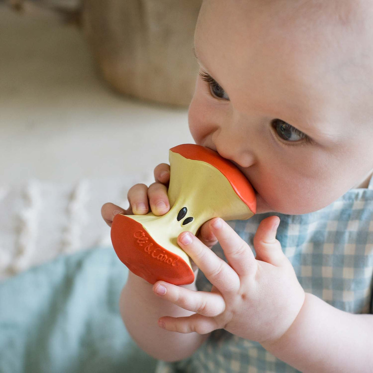 An Oli and Carol natural rubber teething toy