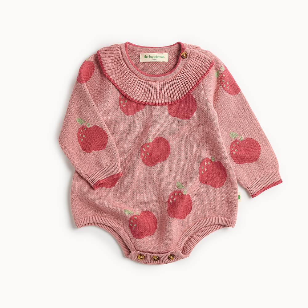 Pink cotton knitted baby romper with apple pattern 
