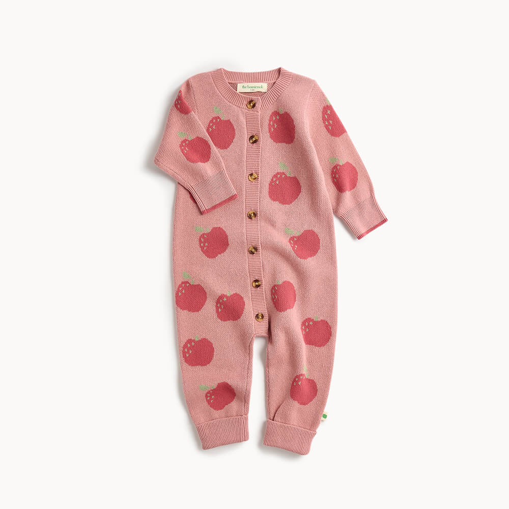 Pink cotton baby playsuit with apple pattern 