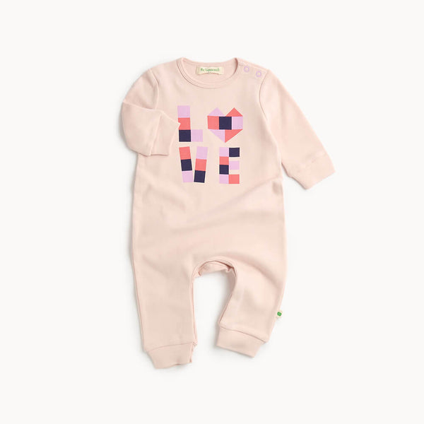 Pink cotton baby playsuit with geometric heart design 