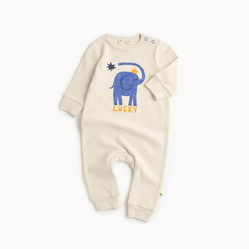 White cotton baby playsuit with blue elephant design and 'Lucky' text 