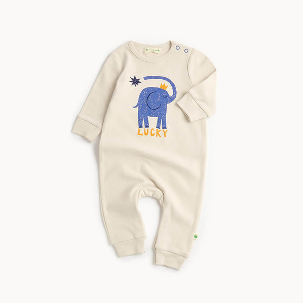 White cotton baby playsuit with blue elephant design and 'Lucky' text 