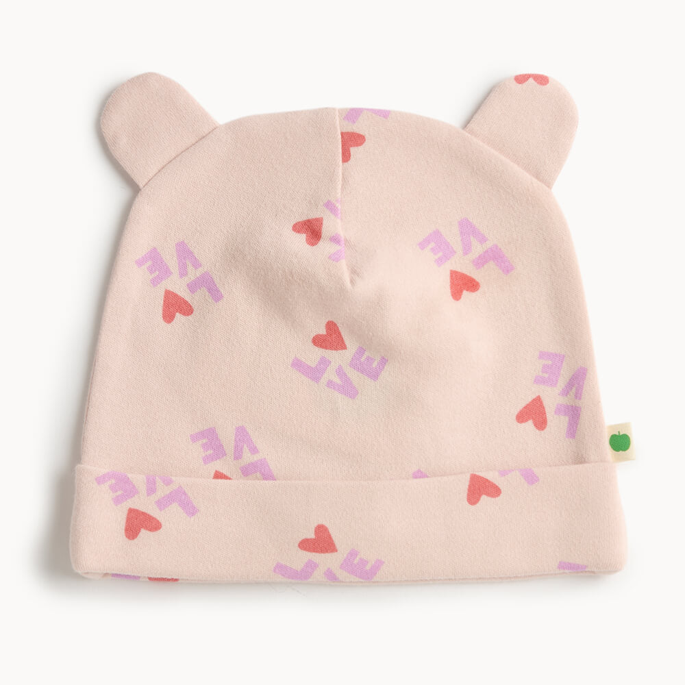 Pink cotton baby hat with heart patterns and bear ears 