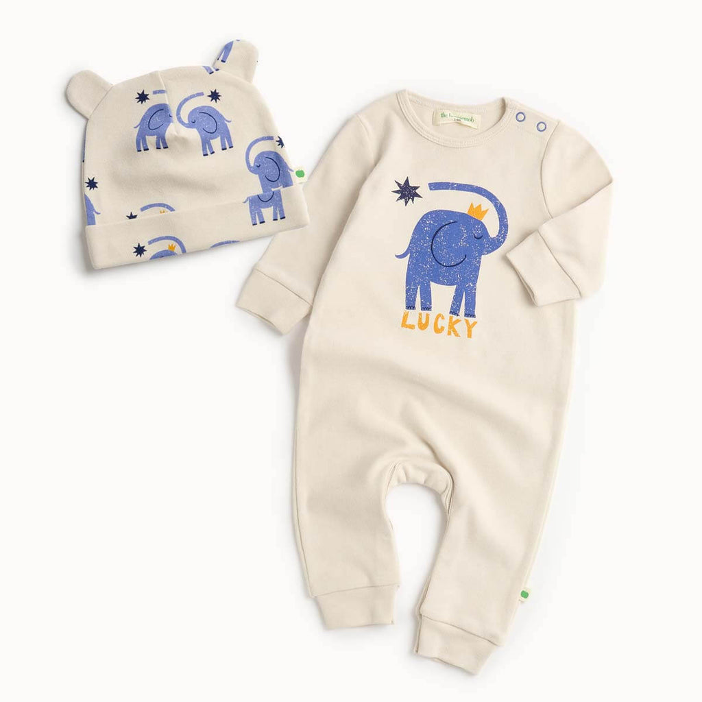 Baby outfit set with white cotton  playsuit and hat featuring blue elephants