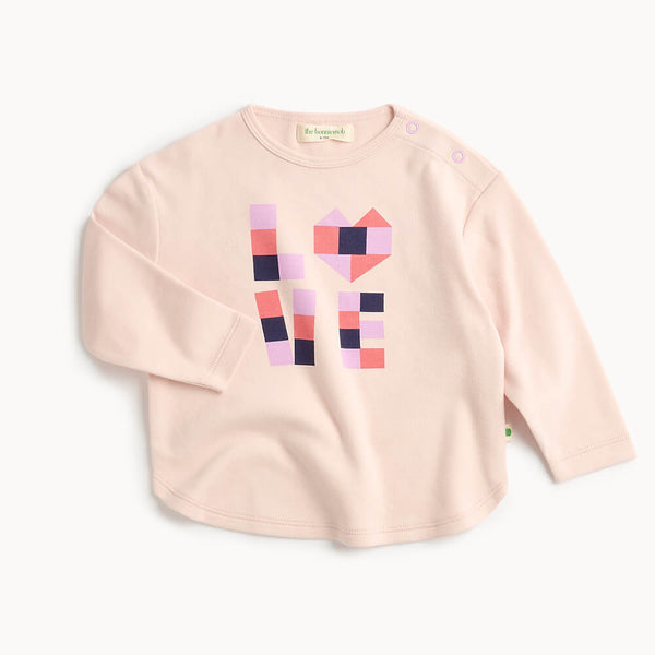 Baby and kid pink long-sleeve shirt with geometric heart design 
