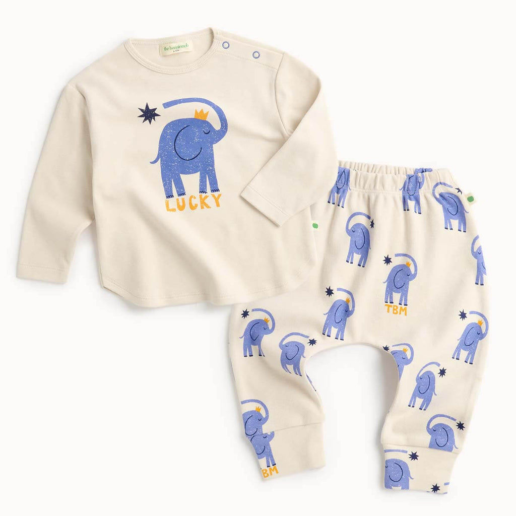 Baby outfit with long-sleeve white cotton long sleeve shirt and pants featuring blue elephants 